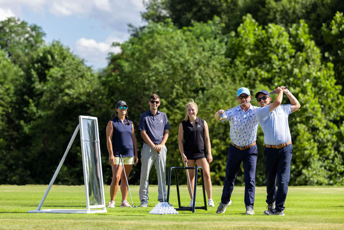 Team of colleagues enjoying a round of golf together at The Clubs At Old Trail in Crozet, VA